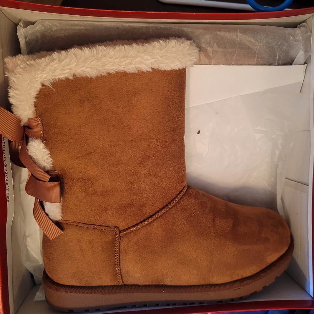 8.5 size Brown Boots never been out of the box.